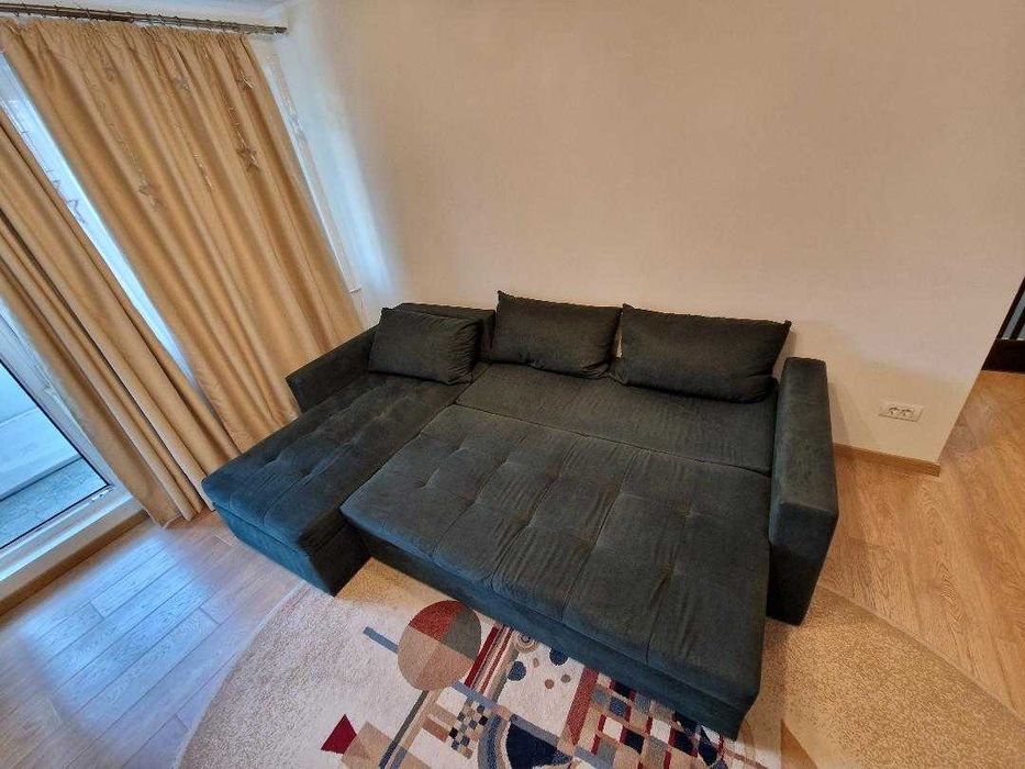 canapea de colt din stofa extensibila