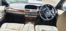 Dezmembrez BMW seria 7 730 d an 2006 motor 3.0 d E65 E66 231 cp radio navigatie display mmi cd player catalizator filtru particule timonerie nuca schimbator cutie viteza automata etrier etriere prag praguri disc discuri frana stanga dreapta dezmembrari
