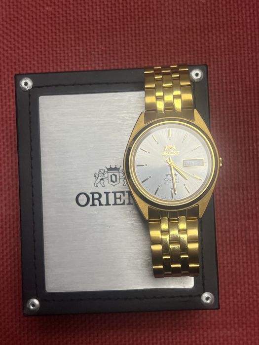 Ceas de mana Orient, suflat in aur