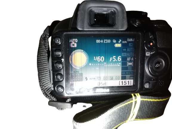 Nikon D3100, 14.2MP + Obiectiv 18-55mm VR + acumulator + incarcator