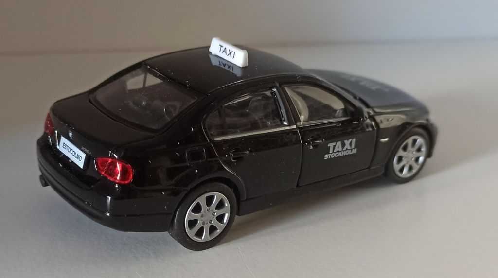 Macheta BMW 330i (E90) 2009 Taxi Stockolm - Welly 1/36