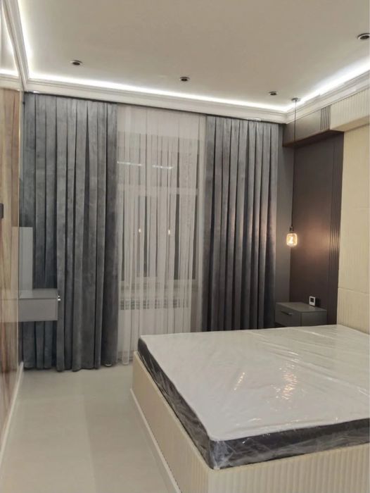 Юнусабад 4 ка. 2-хона 1-этаж.4 Новостройка