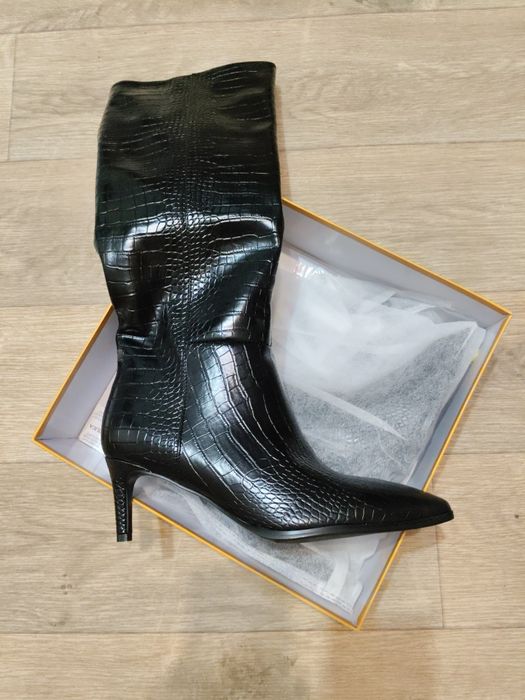 Продам сапоги новые