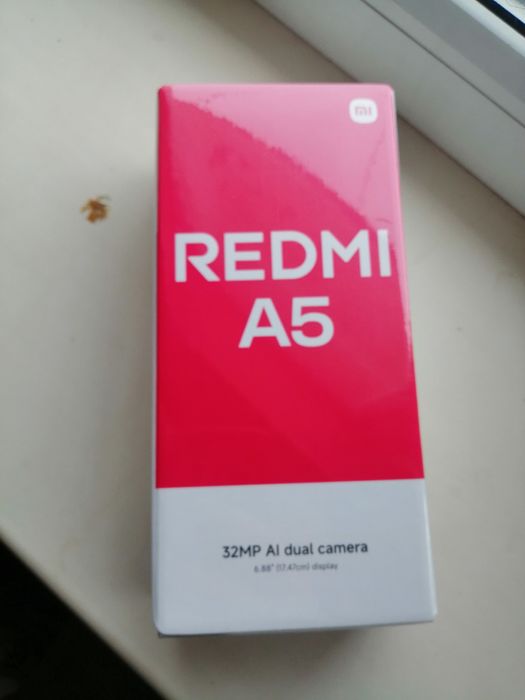 Продам телефон Redmi A5.