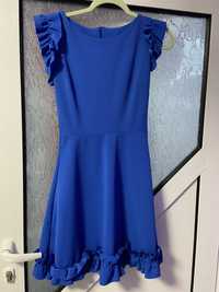 Дамска рокля в тъмно наситено синьо