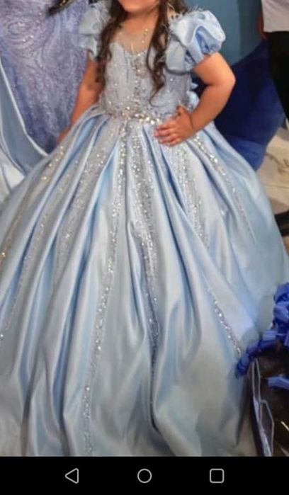 Децка рокля за 7/8 годинки в цвят светло синя с пайети