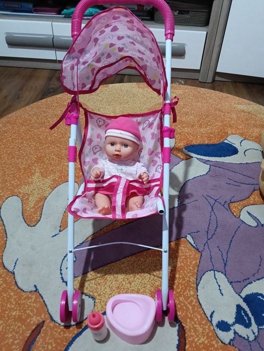 Set bebe, cărucior, oliță și sticluță