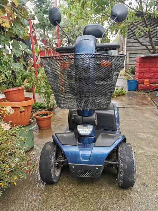 Scuter electric pentru persoane cu probleme de mobilitate