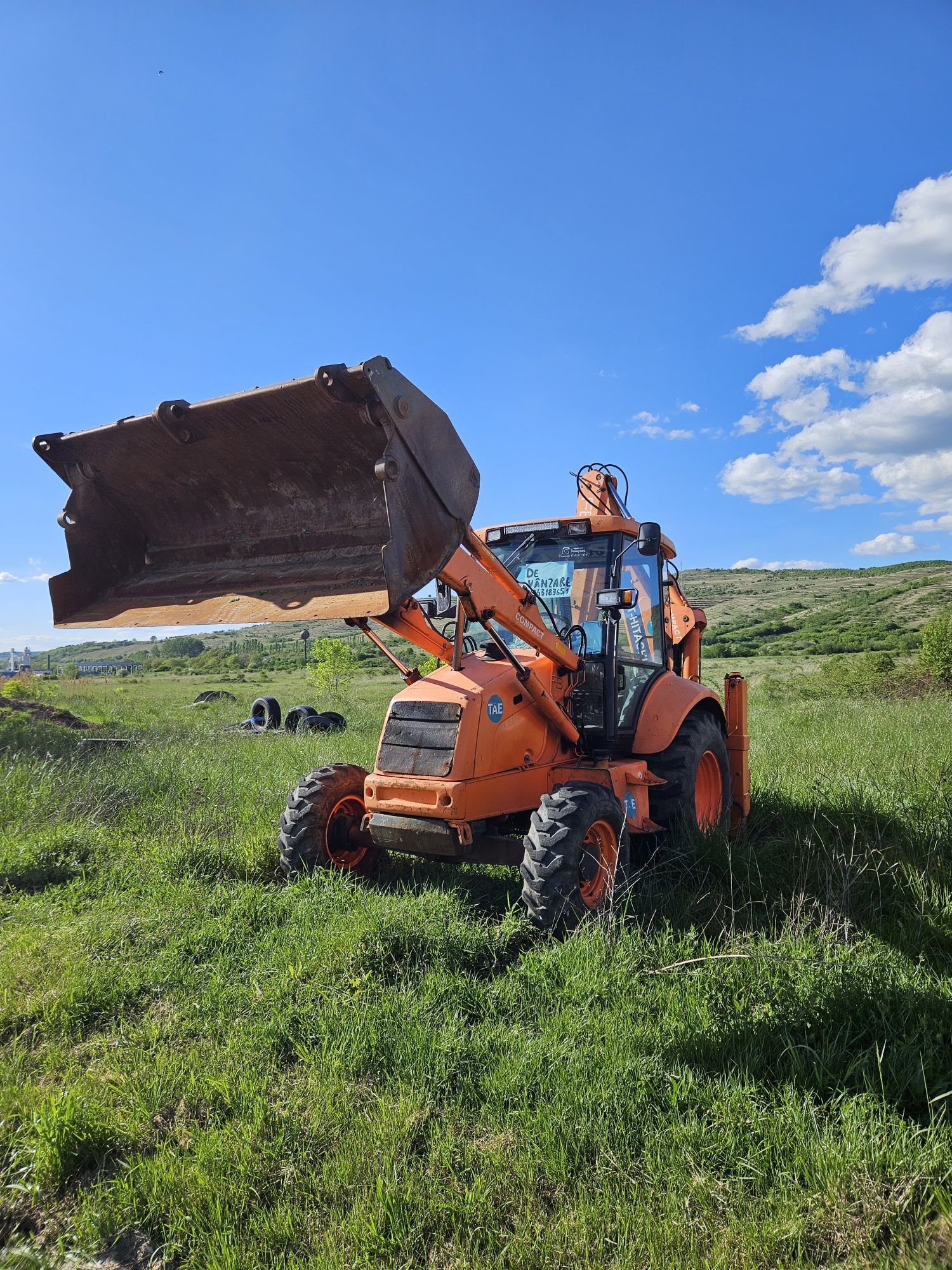 Buldoexcavator  KOMATSU