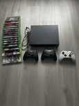Xbox one x 1TB + 3 manete + 17 jocuri
