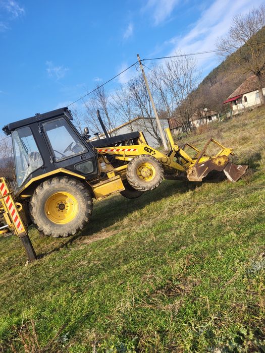 Dezmembrez buldoexcavator caterpilar 428 B