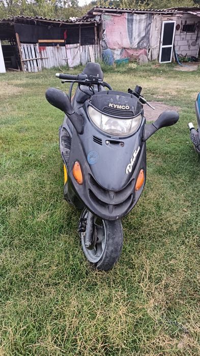 Vând scuter Kymco motor 125 cu acte fac si schimb