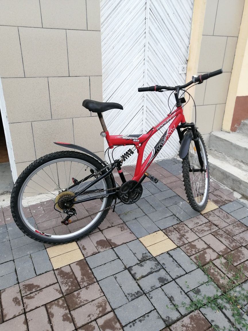 Vând bicicleta MBT cu suspensii