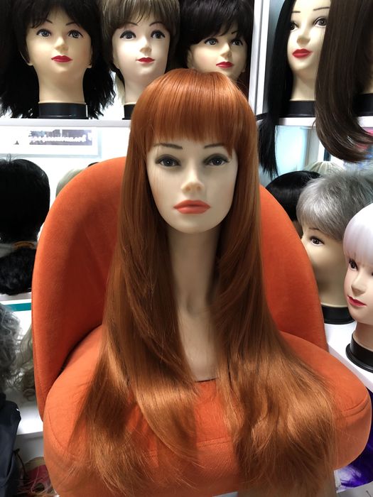 Парики из натурального и японского волокна.