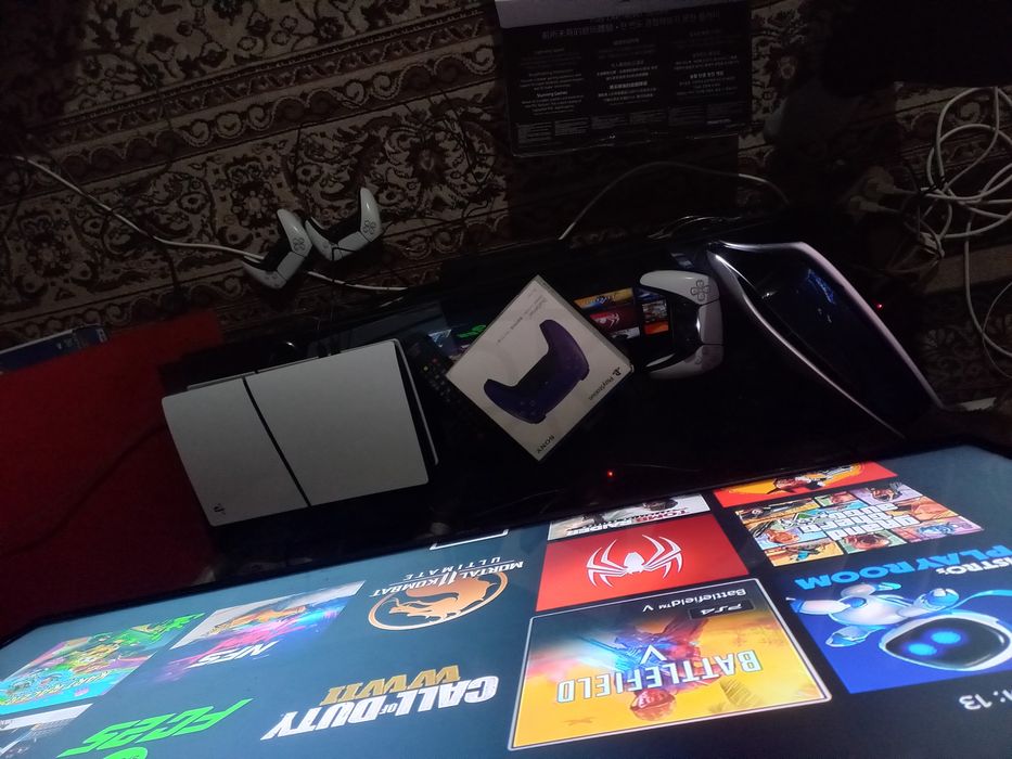 PS5 slimi ideal 1TB hotirasi o'yinlari yozilgan 2 ta original djoystik