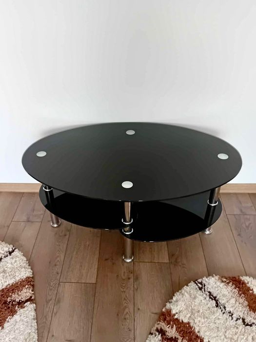 Măsuța de cafea din sticlă neagră