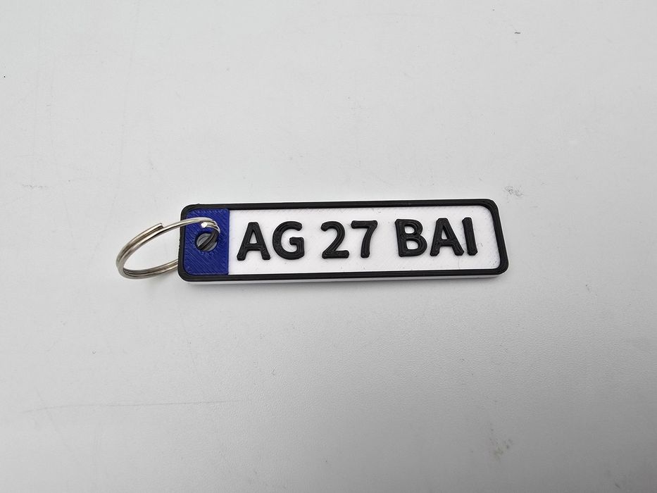 Breloc personalizat în formă de număr auto cu telefon