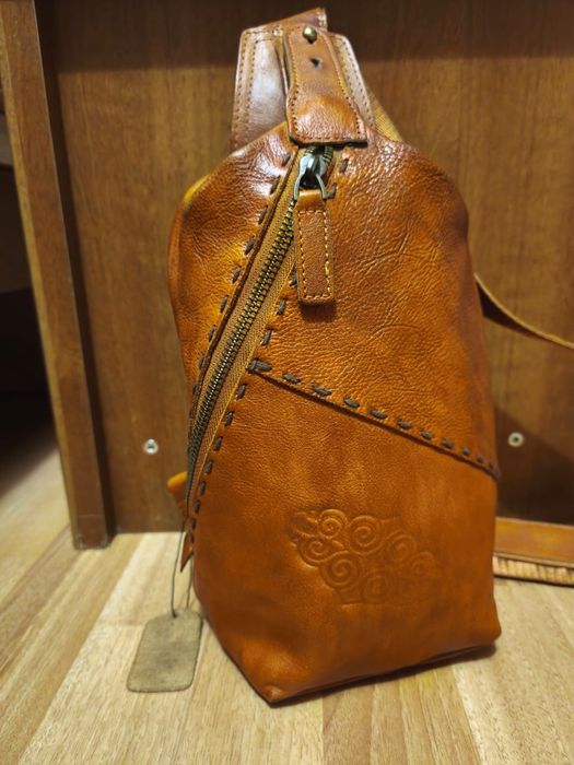 Мужская кожаная сумка национального бренда Khan Mura