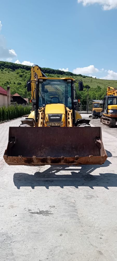 Buldoexcavator komatsu rogi egale 2008