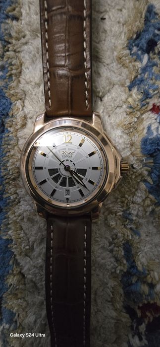 Золотые часы ювелирного дома Ника