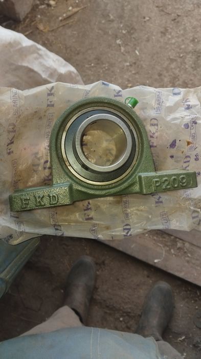 Продам подшипник в корпусе.