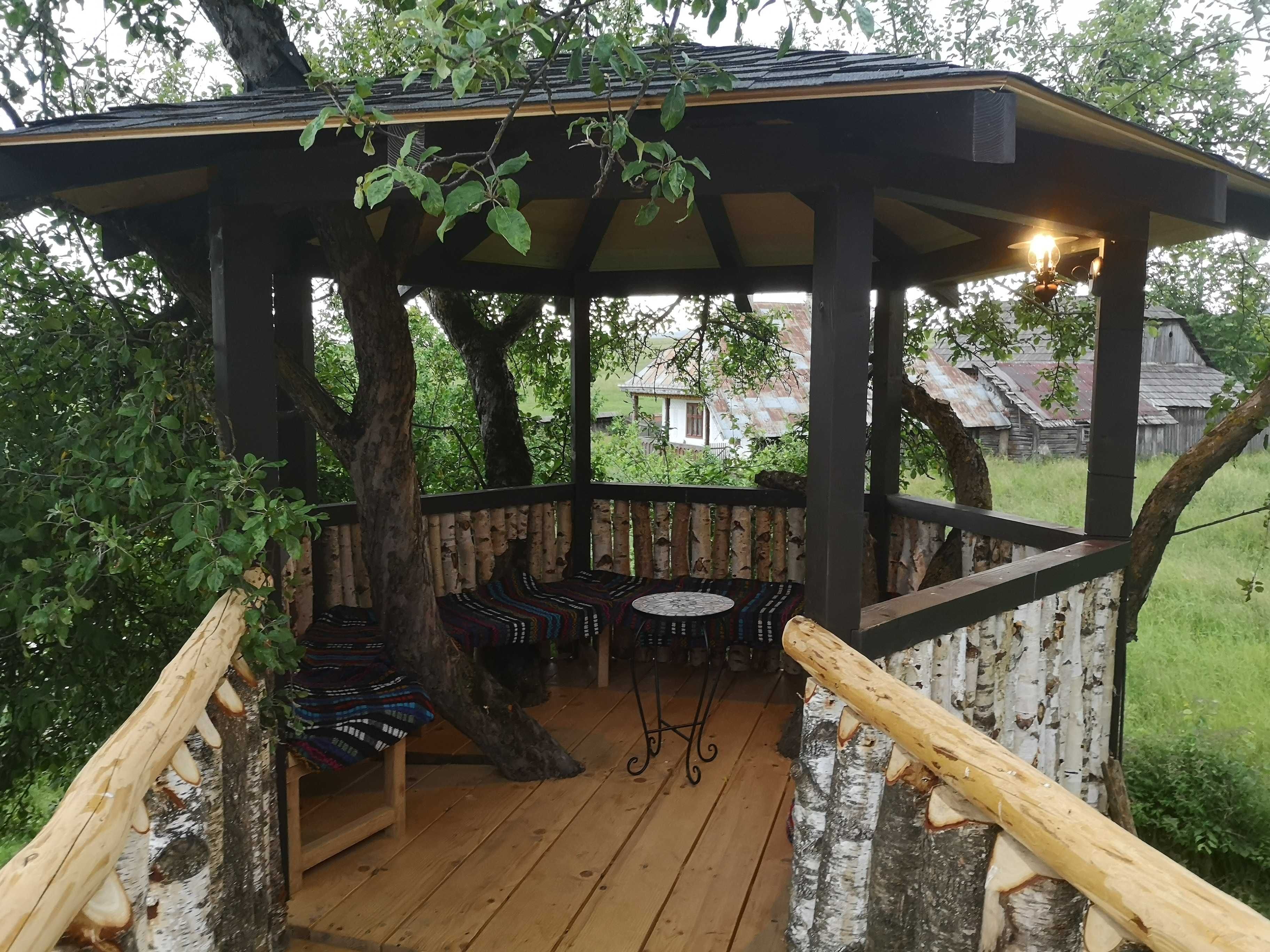 Cabana lemn rotund cu ciubar Bucovina Chalet de inchiriat