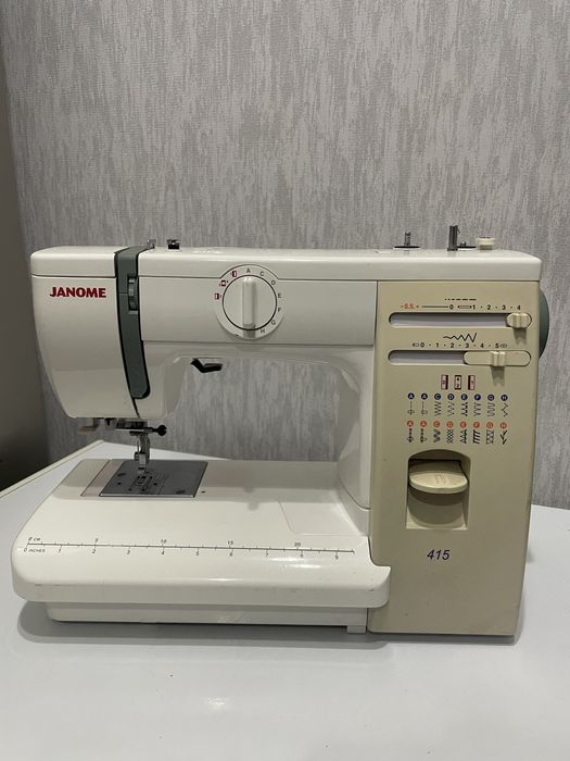 Швейная машинка Janome 415