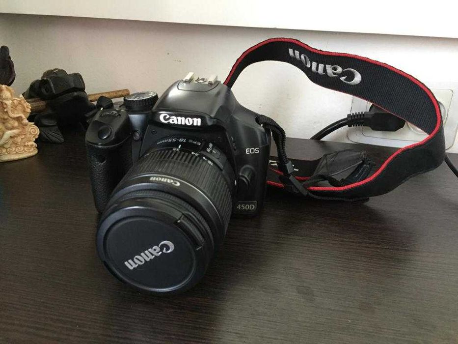 Продам почти новый, отличный цифровой фотоаппарат CANON 450D.