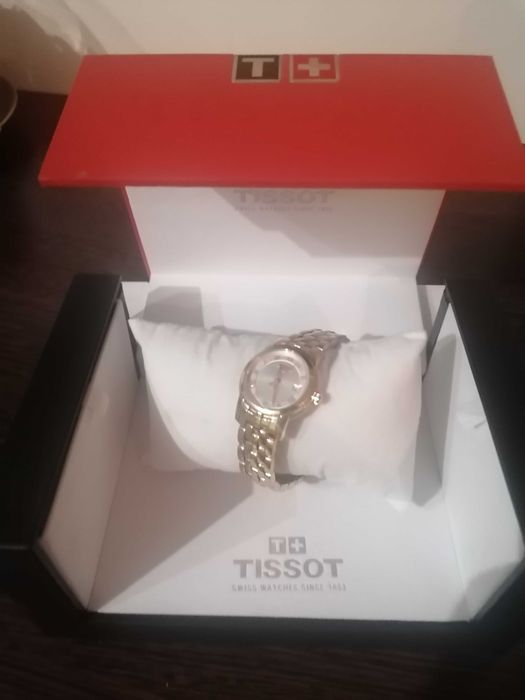 vand ceas dama auriu original Tissot T033.210.33.111.00
