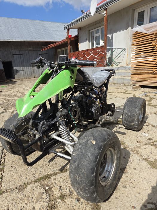 Vand atv 125cc merge impecabil
