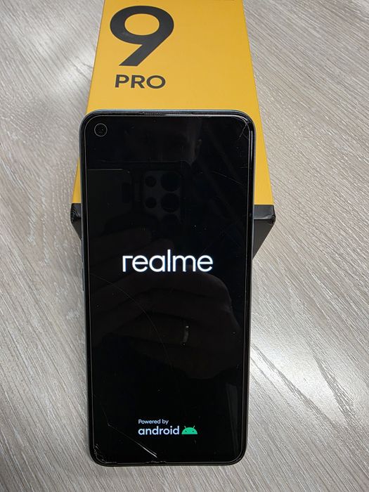 Смартфон Realme 9 pro и наушники realme T100
