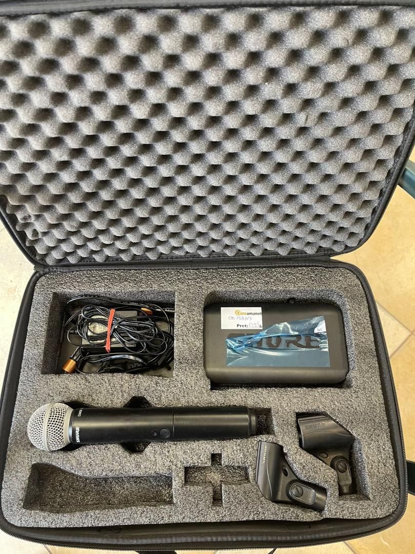 Sistem wireless Shure BLX4/ M17 cu microfon de mana SM58 -A-