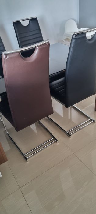 Set masa sticla si 4 scaune piele eco