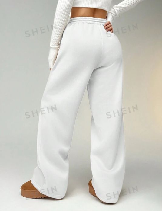 Pantaloni evazati albi