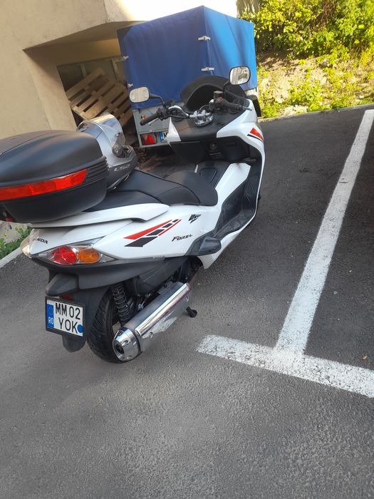 Vând Honda forza NSS 250 an 2009