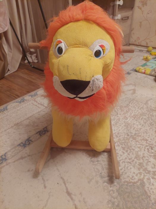 Продам игрушку качалку Лев