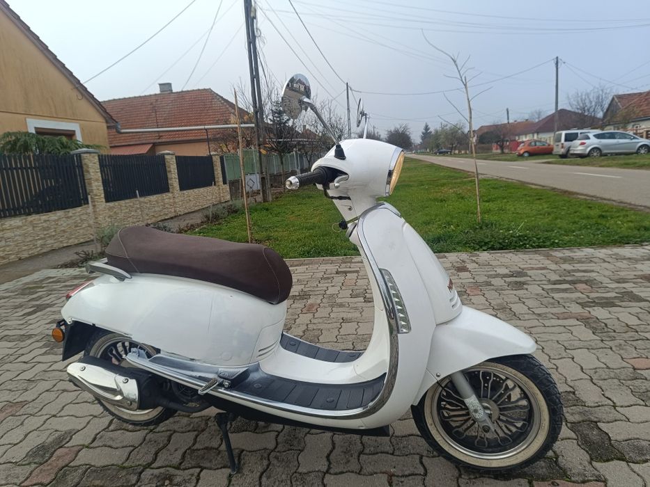 Scuter 125cc     .