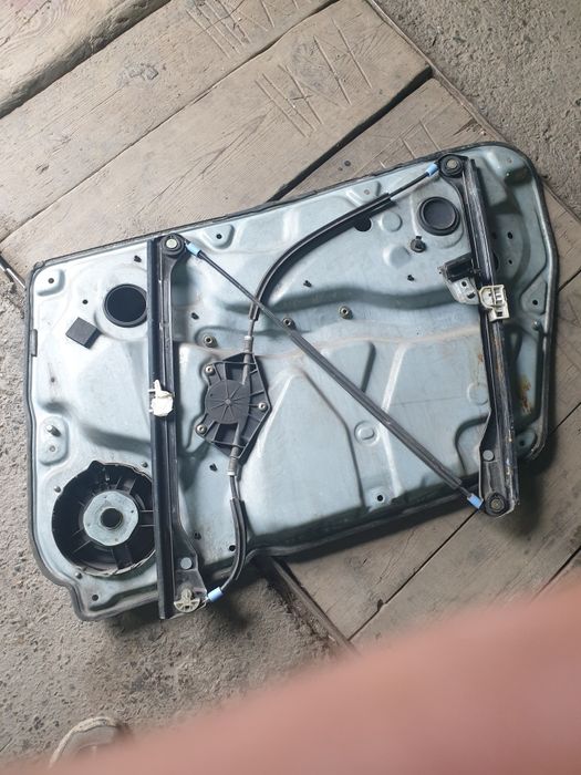 Стеклоподьемник оригинал VW B5 "дельфин"