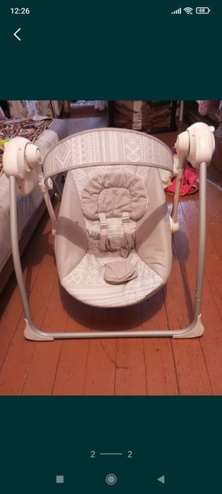 Продам электронный шезлон и стульчик кормл.