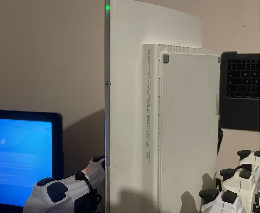 Ps3 superslim 1TB 4 controllere wireless 9 jocuri 1-4 jucatori sigilat