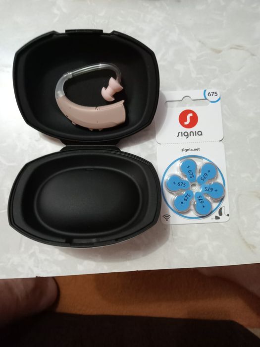 Продам новый слуховой аппарат