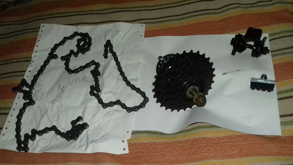 Piese bicicleta:lanț-KMC ,butuc 6 stele,clema scaun,sabot frina