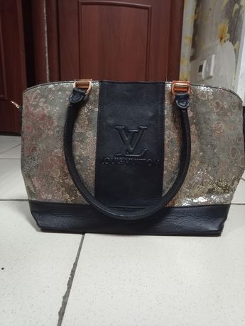 Продаю кожанную сумку Louis Vuitton