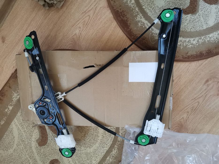 Macara stânga fata BMW e87 sedan