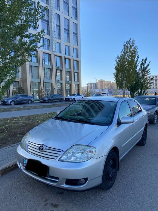 Машина Тайота каролла