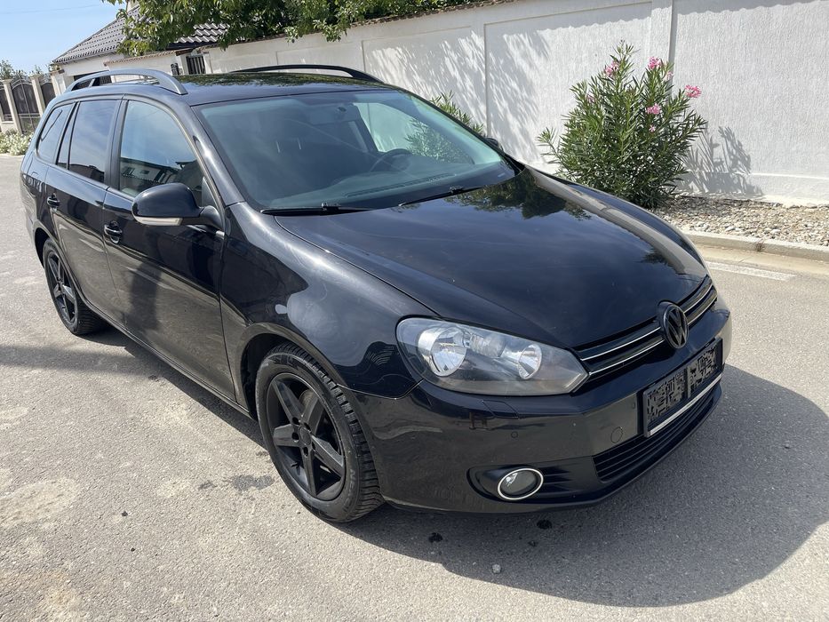 VW Golf VI 1.6 TDI, navigatie,pilot automat,klima,geamuri electrice