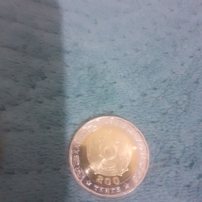 Манеты 2шт по 10000т