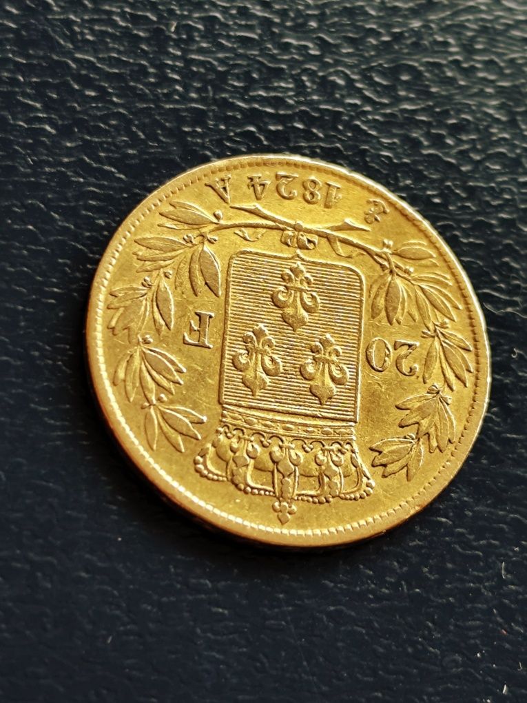 20 франка 1824 год.,Луи XVIII, злато 6.45 гр.,900/1000 (21.6 карата)