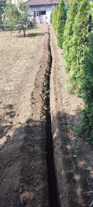 Săpăm șanțuri mecanizat cu trencher