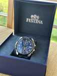 Ceas Festina foarte putin utilizat.
